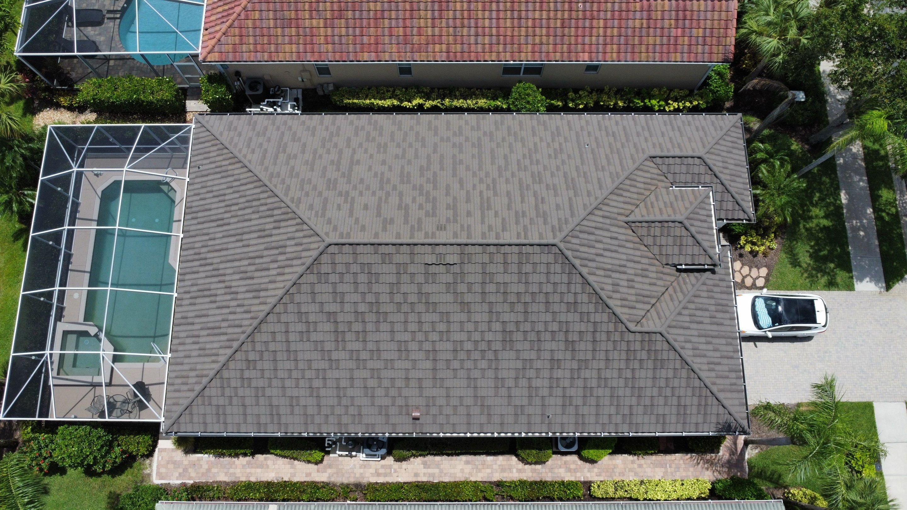 Aerial view of completed residential shingle roof project